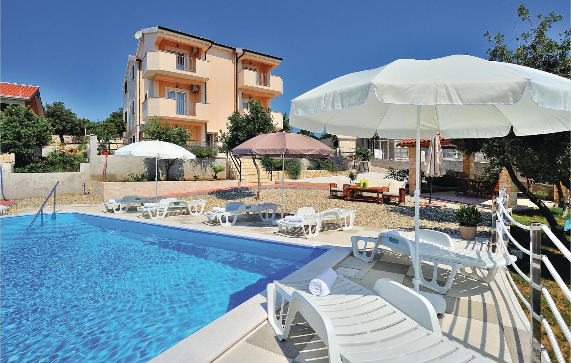 Cozy Apartment In Posedarje With House Sea View Экстерьер фото