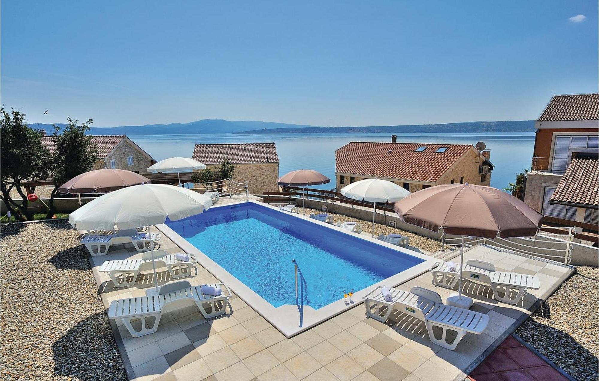 Cozy Apartment In Posedarje With House Sea View Экстерьер фото